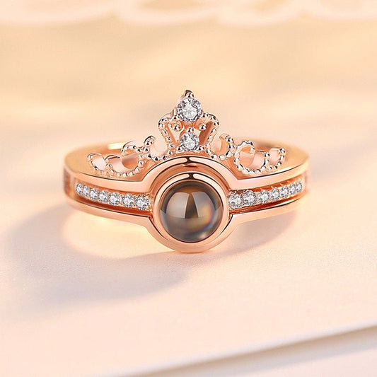 SET x2 ANILLOS 100 TE AMO™ — Proyección + Corona | Ajustable | Caja Regalo