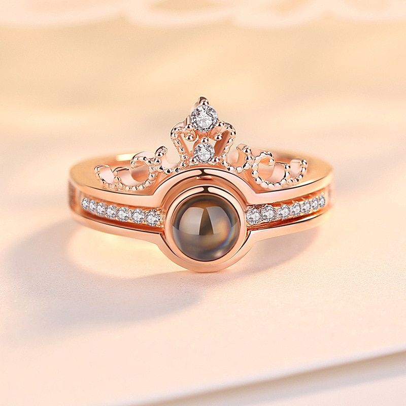 SET x2 ANILLOS 100 TE AMO™ — Proyección + Corona | Ajustable | Caja Regalo