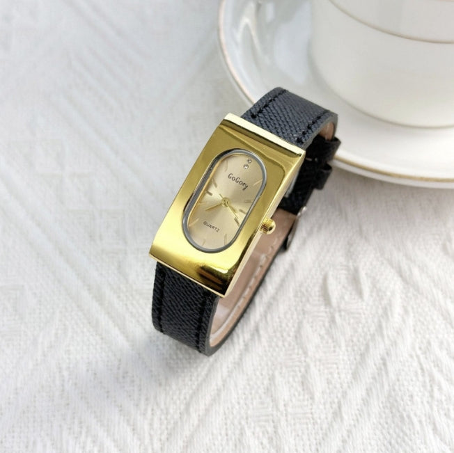 SET VELVET DYNASTY™ · Reloj Gold Rectangular + Gafas Ovaladas Gold · Mujer