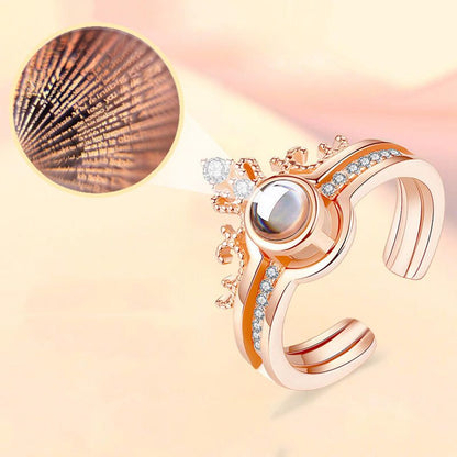 SET x2 ANILLOS 100 TE AMO™ — Proyección + Corona | Ajustable | Caja Regalo