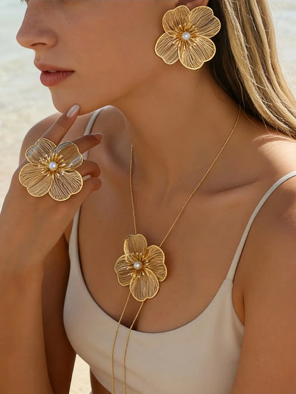 SET FLEUR D'OR™ · Aretes + Collar + Anillo Flor Dorada con Perla
